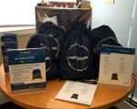 table of donated supplies to homeless shelters